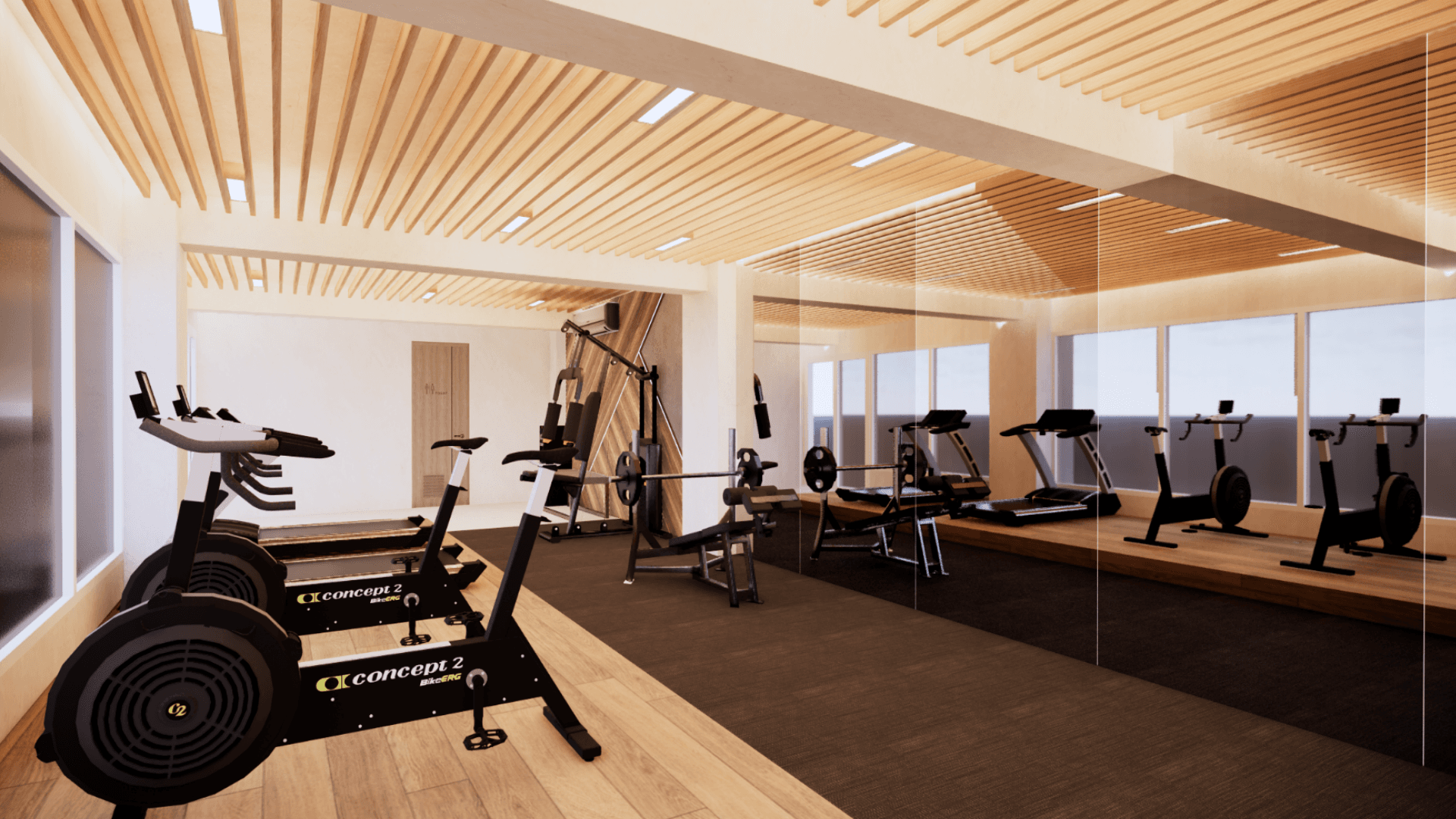 The panoramic gym at Aleevia Carter, wood-slatted ceiling and equipment beside floor-to-ceiling windows.